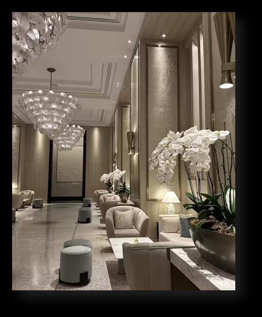 Waldorf Astoria Doha West Bay — lobby lounge with crystal chandeliers and orchid arrangements