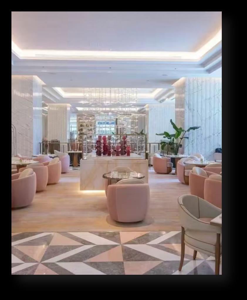 Waldorf Astoria Doha West Bay — restaurant with pink-blush curved banquettes